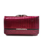 Portefeuille femme compact en cuir véritable verni effet crocodile avec fermoir métallique