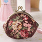 Porte-monnaie vintage à fermoir clic-clac en toile fleurie pour femme