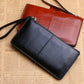 Portefeuille femme long en cuir PU vintage avec zip et dragonne grande capacité