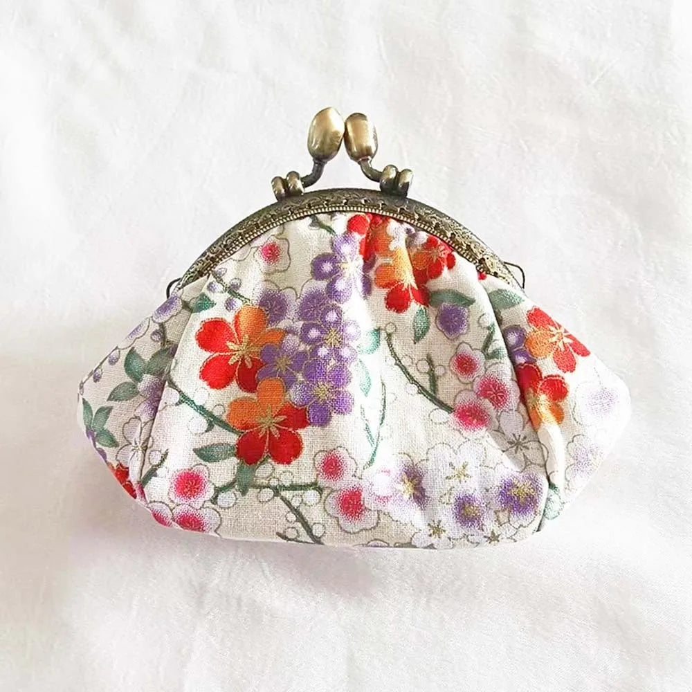 Porte-monnaie vintage à fermoir clic-clac en toile fleurie pour femme