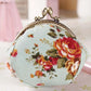 Porte-monnaie vintage à fermoir clic-clac en toile fleurie pour femme