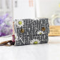Portefeuille femme compact en tissu coton avec rabat et compartiments multiples
