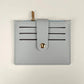 Porte-cartes ultra-fin en cuir pu avec languette à bouton pression pour homme et femme