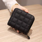 Portefeuille femme compact en cuir PU matelassé avec zip et fermoir sécurisé