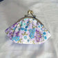 Porte-monnaie vintage à fermoir clic-clac en toile fleurie pour femme