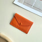Porte-carte enveloppe en cuir de vachette véritable - élégance minimaliste