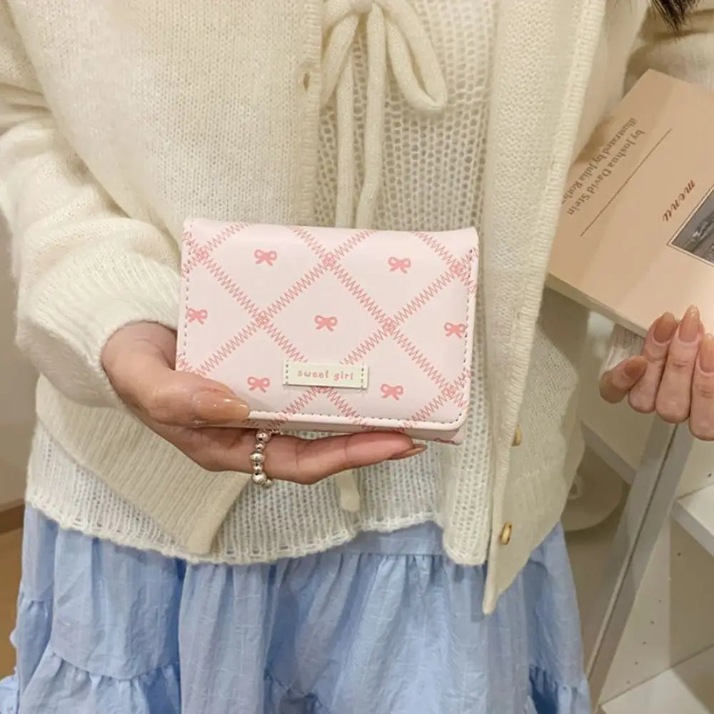 Mini portefeuille trois volets à motif nœuds et broderies pour femme — photo 1