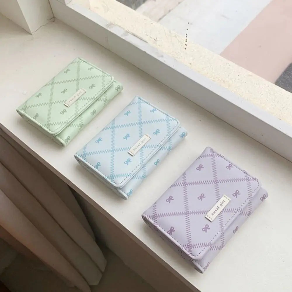 Mini portefeuille trois volets à motif nœuds et broderies pour femme — photo 4