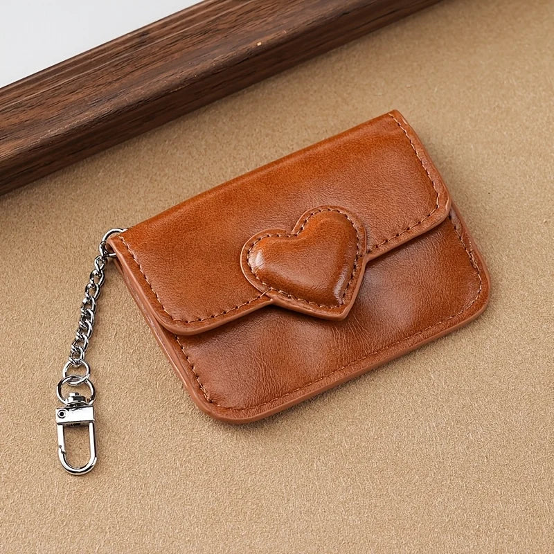 Porte-monnaie compact en similicuir avec compartiments et motif cœur pour femme — photo 1