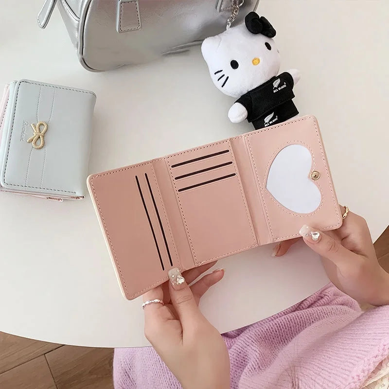 Portefeuille compact à nœud doré et triple volet pour fille — photo 1