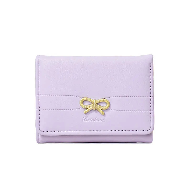 Portefeuille compact à nœud doré et triple volet pour fille — photo 11