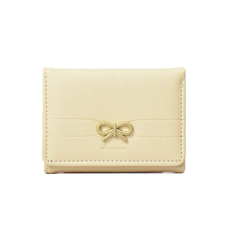 Portefeuille compact à nœud doré et triple volet pour fille — photo 7