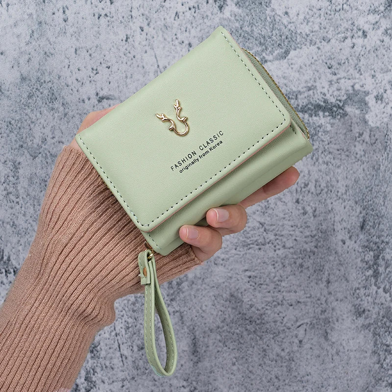 Portefeuille femme compact en cuir PU avec zip, rabat et dragonne multifonction — photo 10