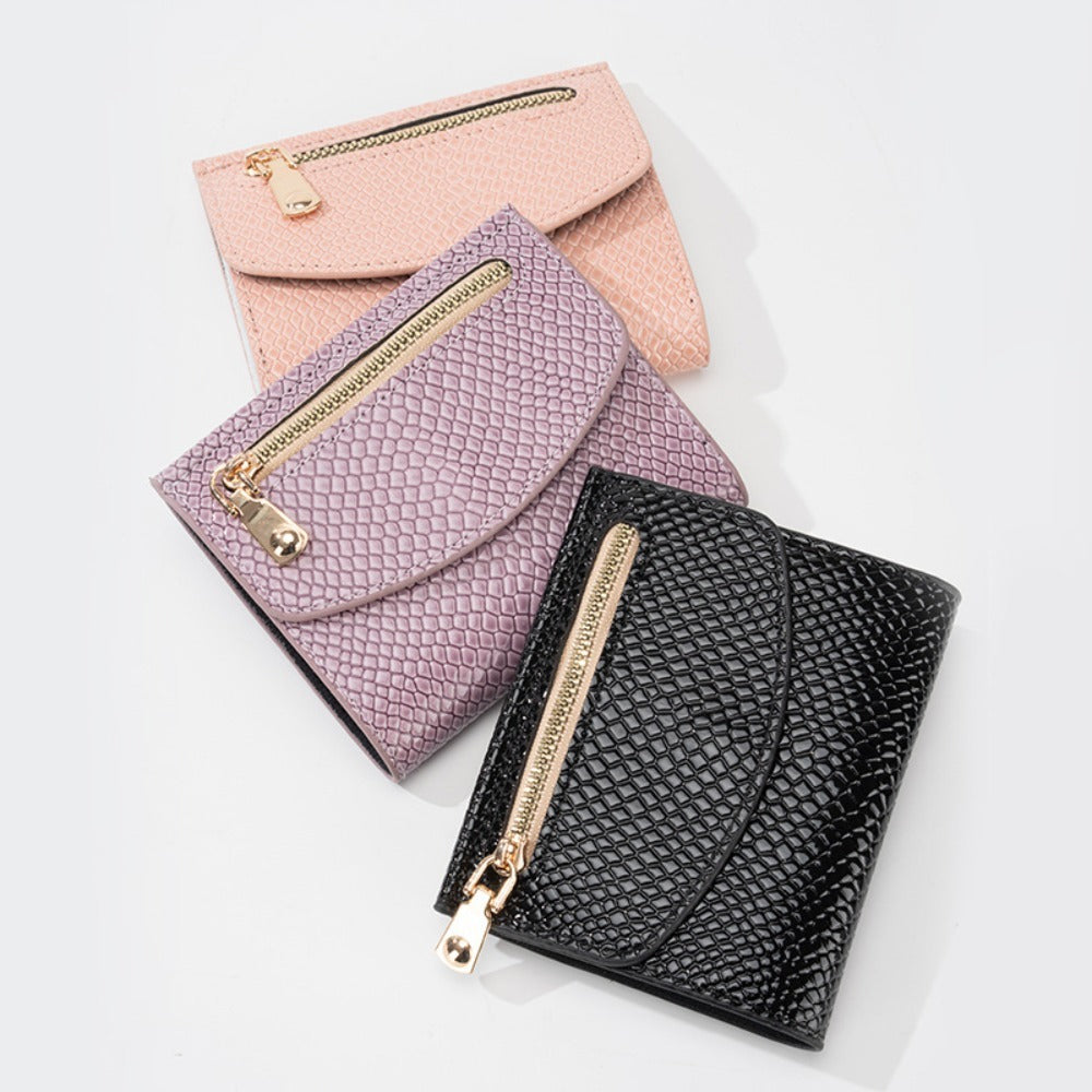 Portefeuille femme fin noir, simili grainé façon python