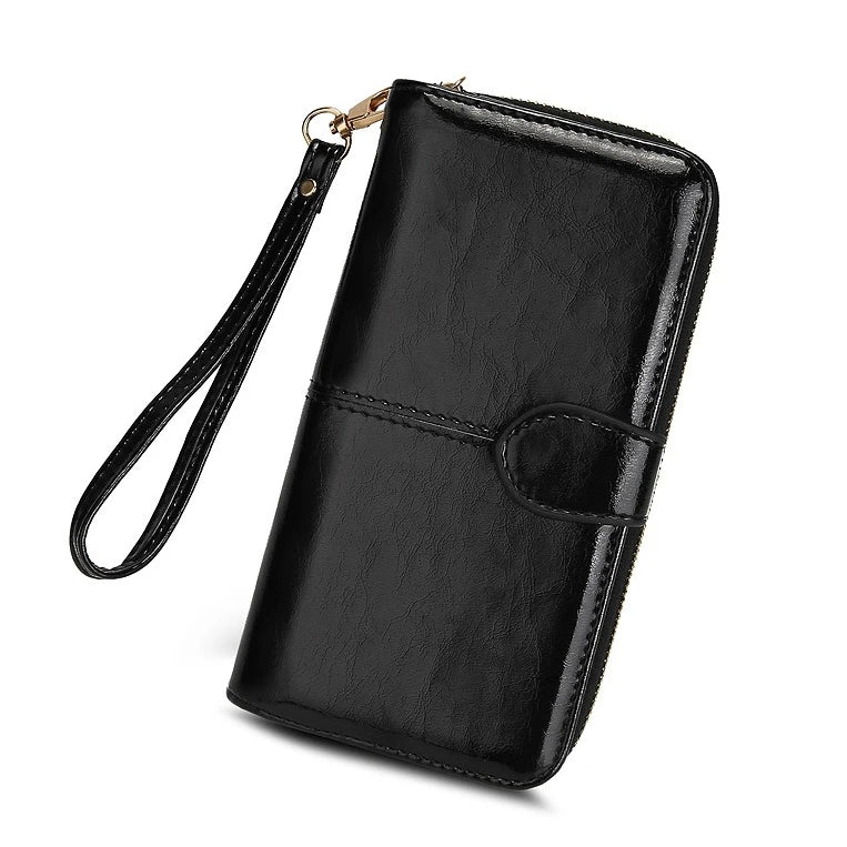 Portefeuille long anti-theft en cuir pu avec fermeture éclair et dragonne pour femme — photo 11