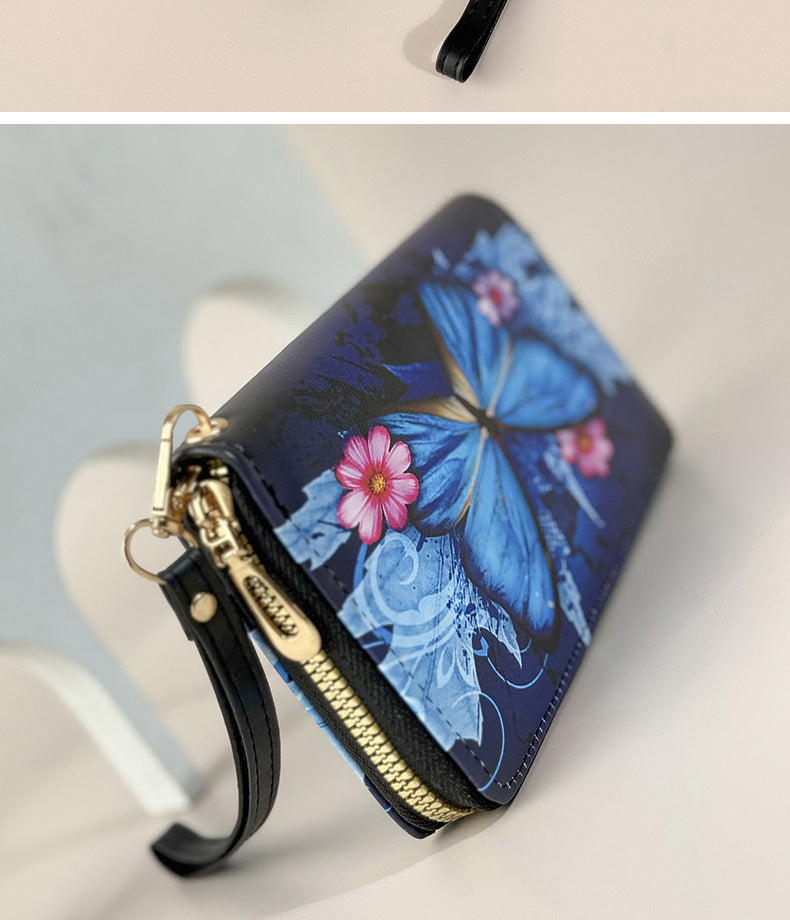 Portefeuille femme long imprimé papillon, zip et dragonne