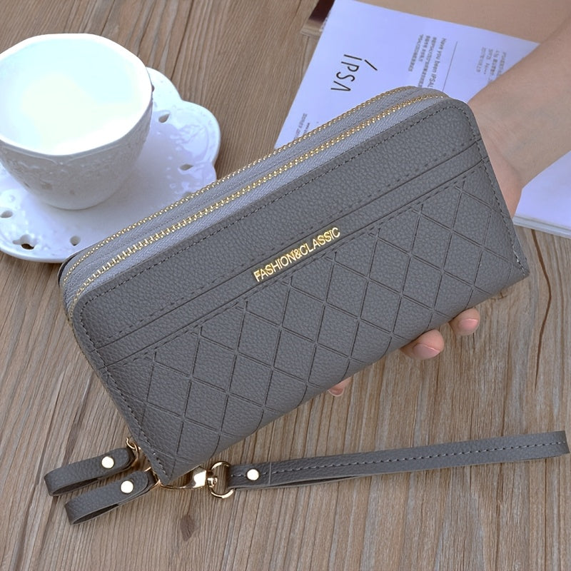 Portefeuille femme long matelassé noir à poche téléphone