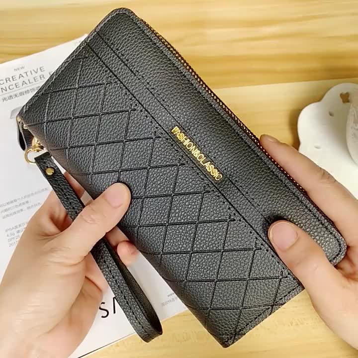 Portefeuille femme long matelassé noir à poche téléphone