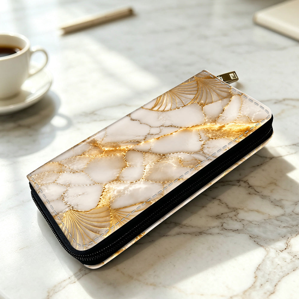 Portefeuille femme long zippé imprimé marbre blanc et or