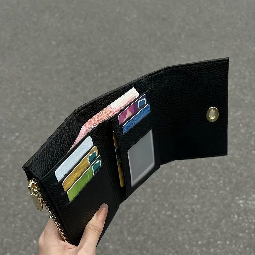 Portefeuille femme noir compact à tourniquet métallique doré