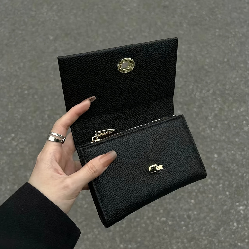 Portefeuille femme noir compact à tourniquet métallique doré