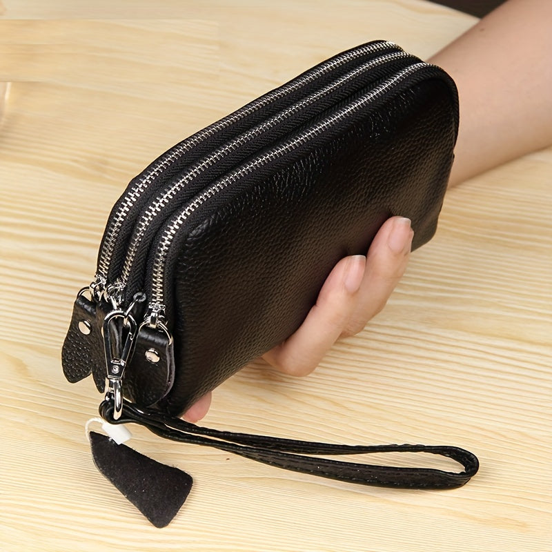 Portefeuille femme pochette à trois compartiments zippés