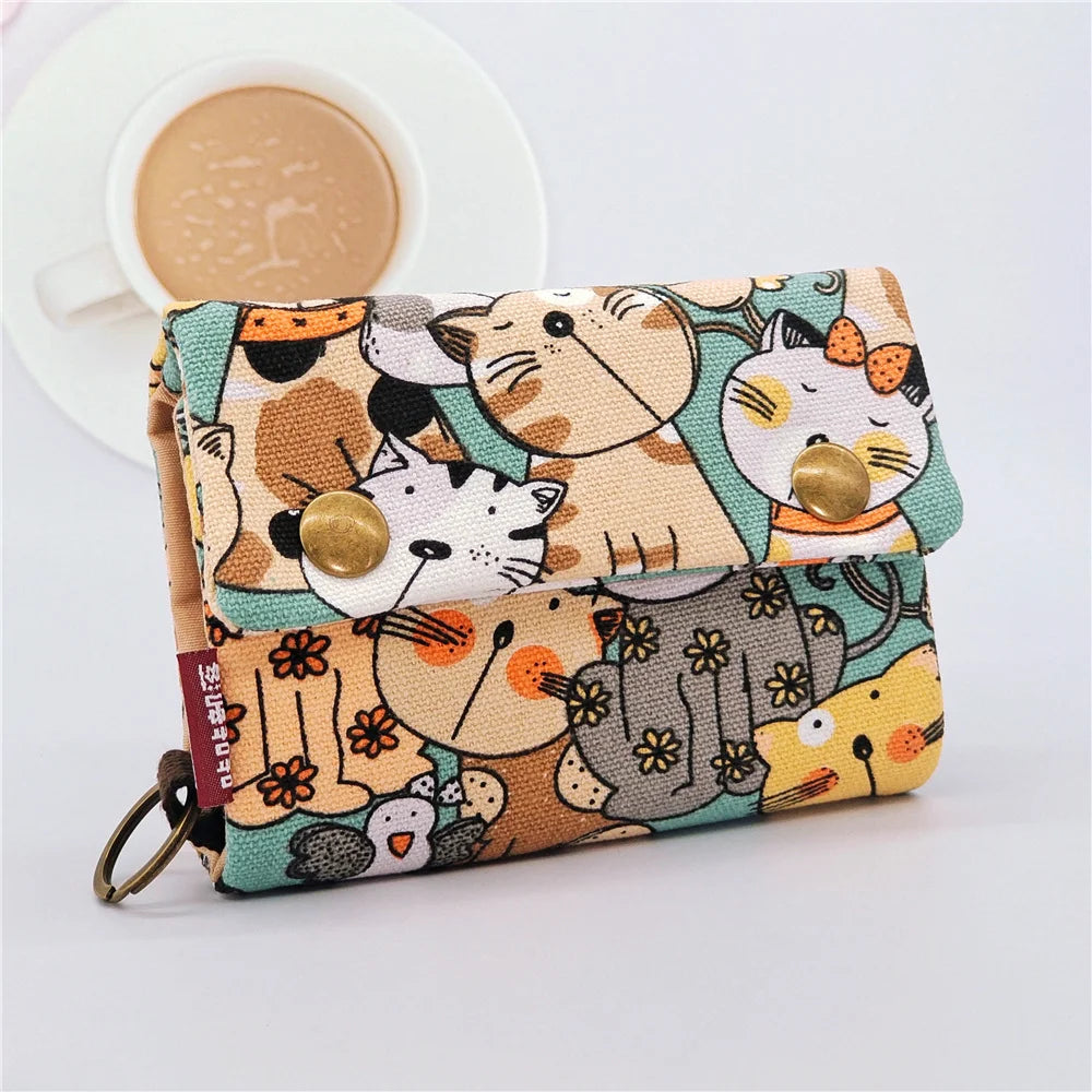 Portefeuille femme compact en tissu coton avec rabat et compartiments multiples — photo 4