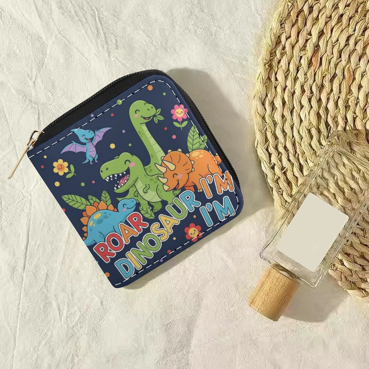 Portefeuille femme zippé 10 cm, dinosaures sur bleu nuit