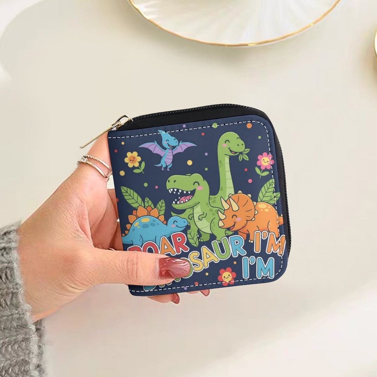 Portefeuille femme zippé 10 cm, dinosaures sur bleu nuit