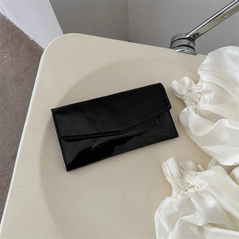 Portefeuille long pour femme en cuir verni brillant style pochette — photo 5